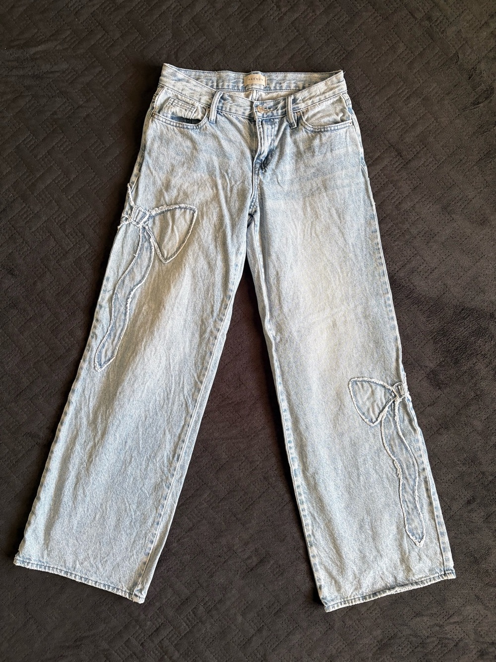 Casey low rise baggy Jeans with Embroidered Bow Detail